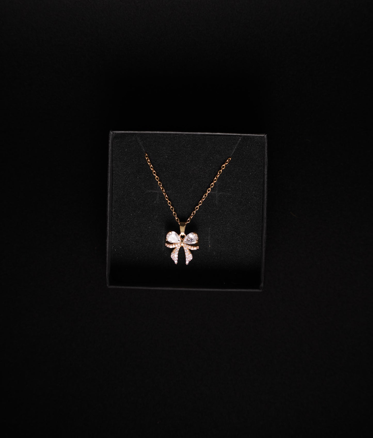 Bow tie necklace